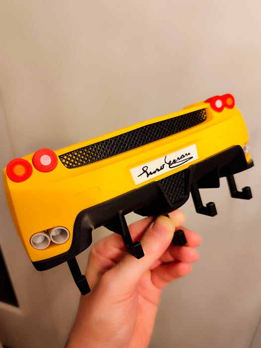 Colgador de llaves de Autos