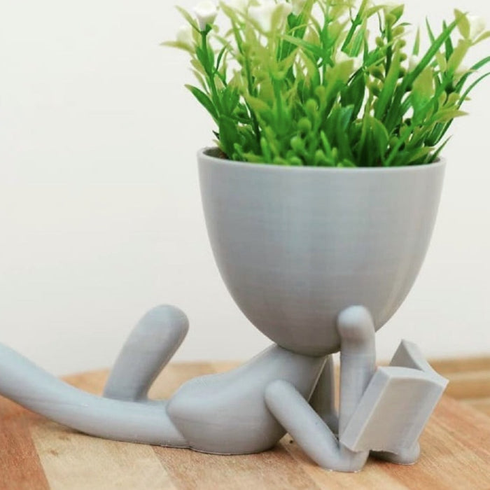 Maceta Boby Pose Lector