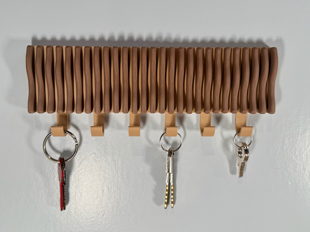 Colgador de llaves ondulado