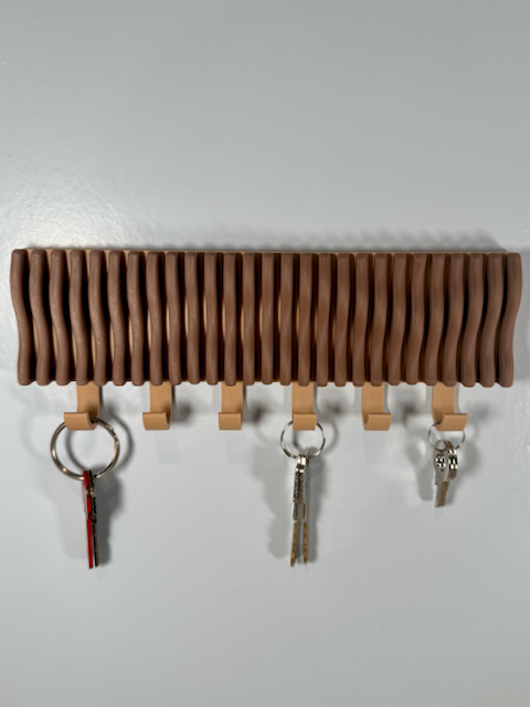 Colgador de llaves ondulado
