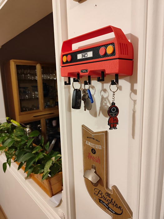 Colgador de llaves de Autos