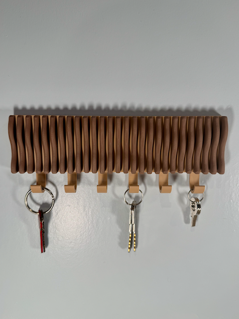 Colgador de llaves ondulado