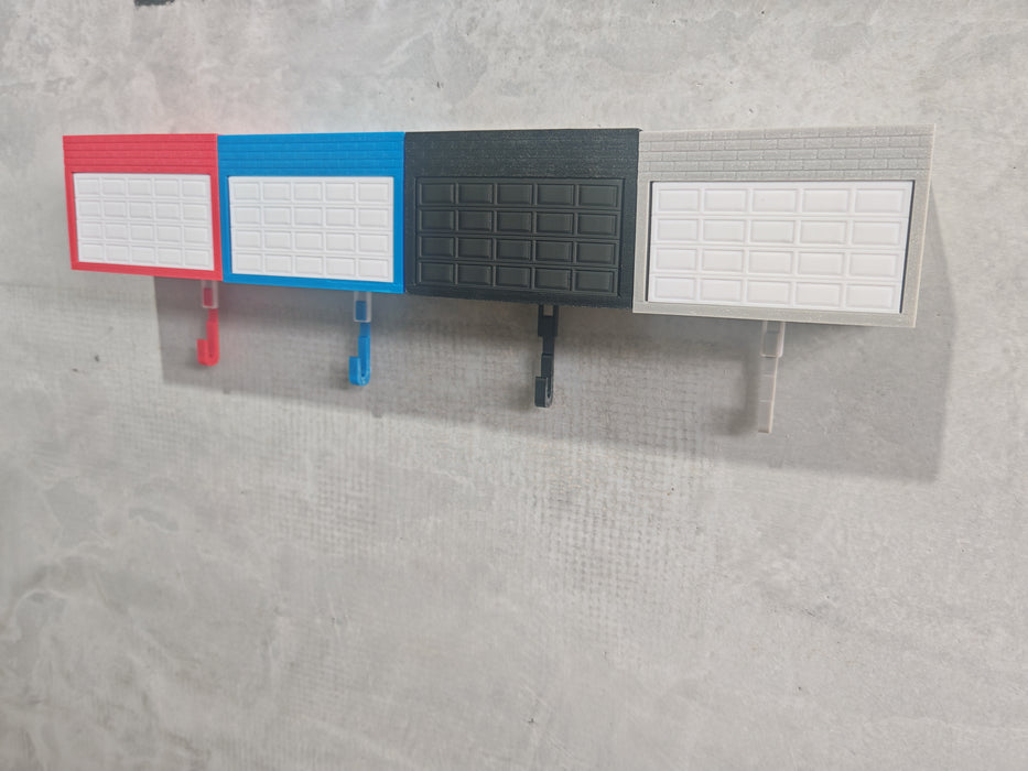 Llavero para garaje con puerta que se abre