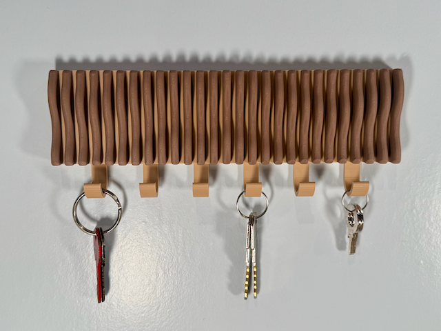 Colgador de llaves ondulado